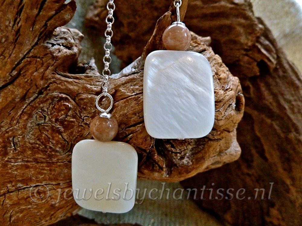 Zilveren oorbellen met Zonnesteen